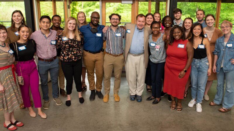 Kenan Scholars with Mr. Tom Kenan at a reception on April 26, 2022