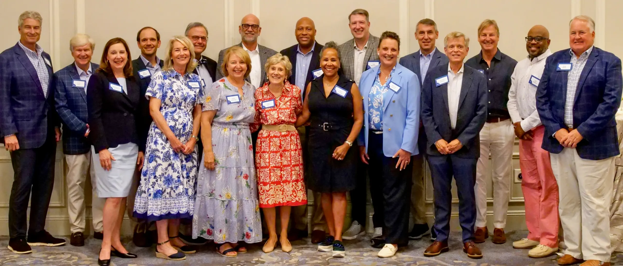 Healthcare foundation board of directors posing together at a formal event for healthcare philanthropy
