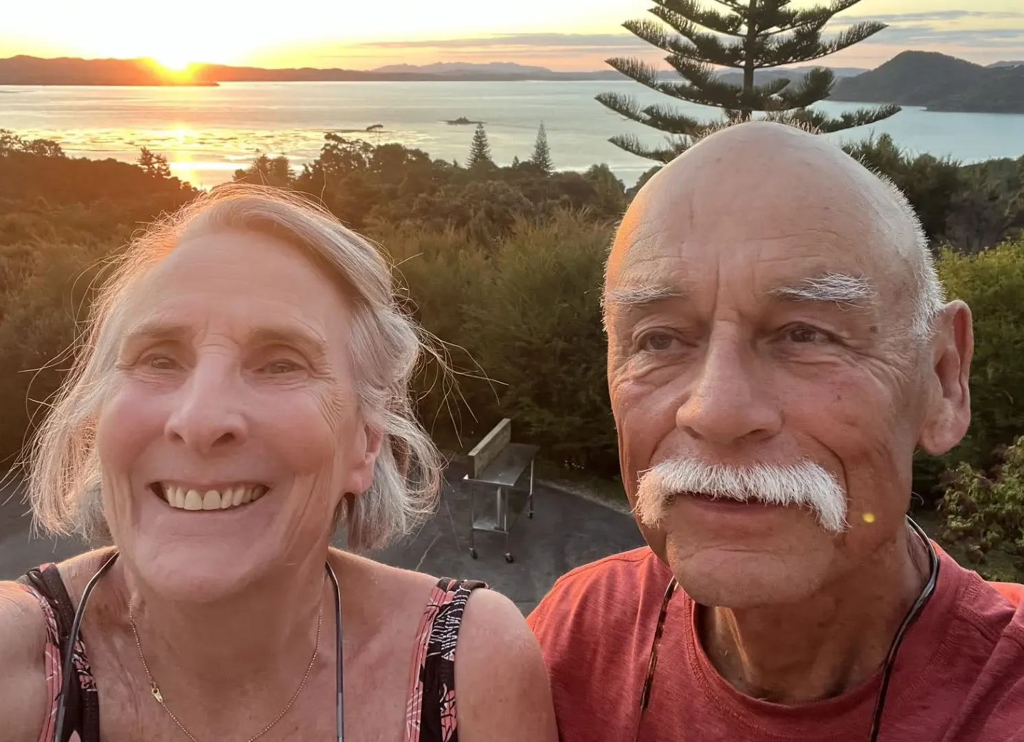 Healthcare philanthropists and UNC School of Medicine faculty members smile during a scenic outdoor trip after donating a leading center for addiction research.