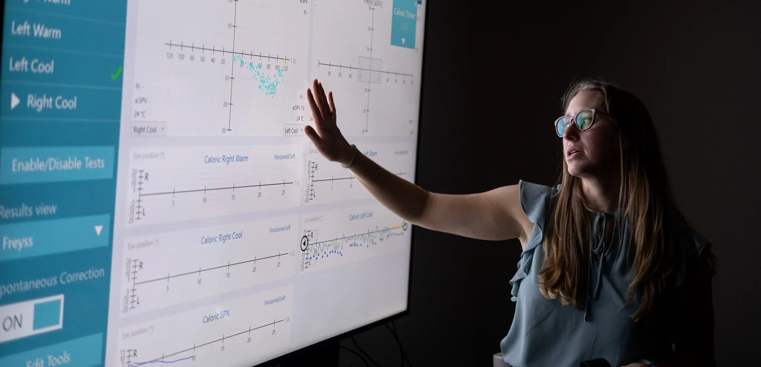 UNC School of Medicine professor presents a chart to a group of scholarship students
