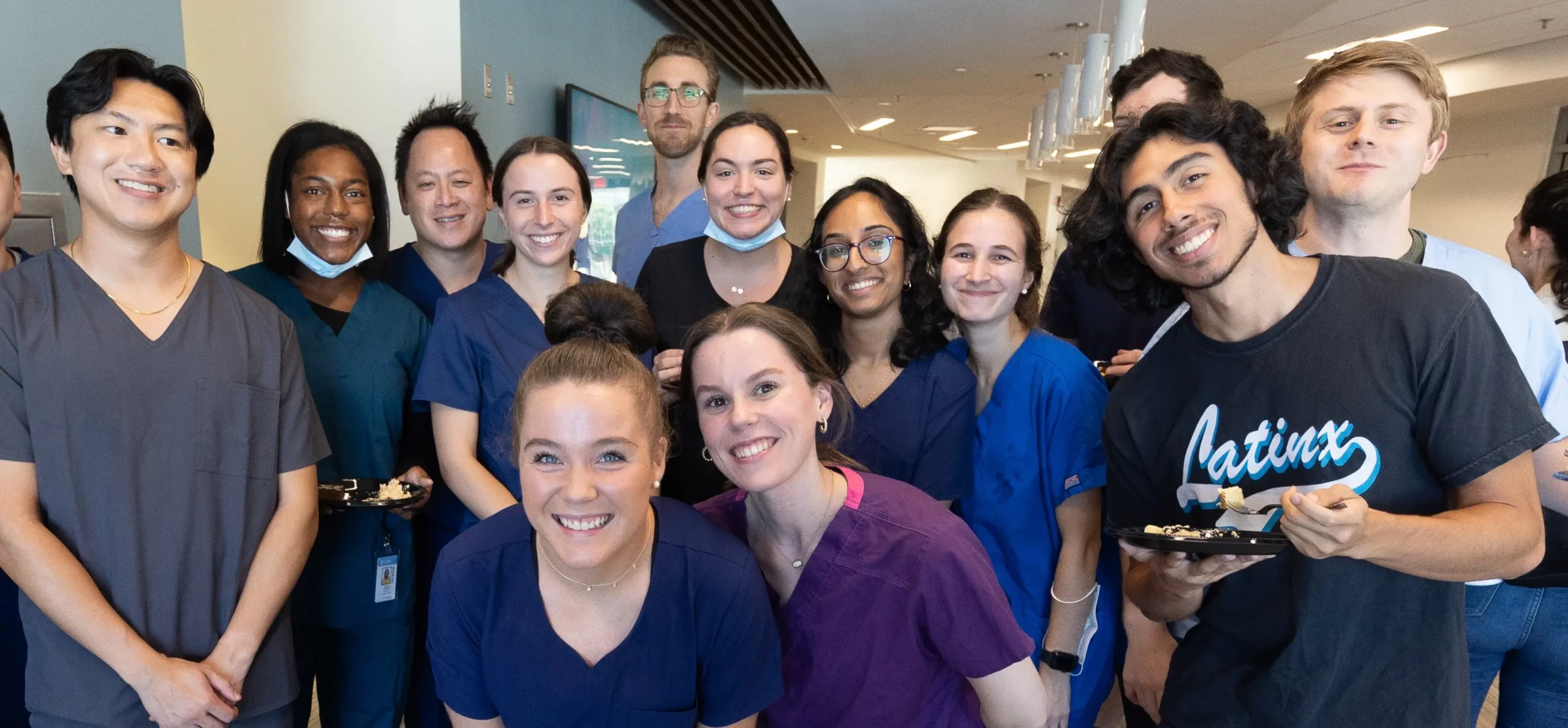A diverse group of UNC Health medical students and UNC School of Medicine faculty partners gather for a group photo during a learning and networking event funded by cancer research donors