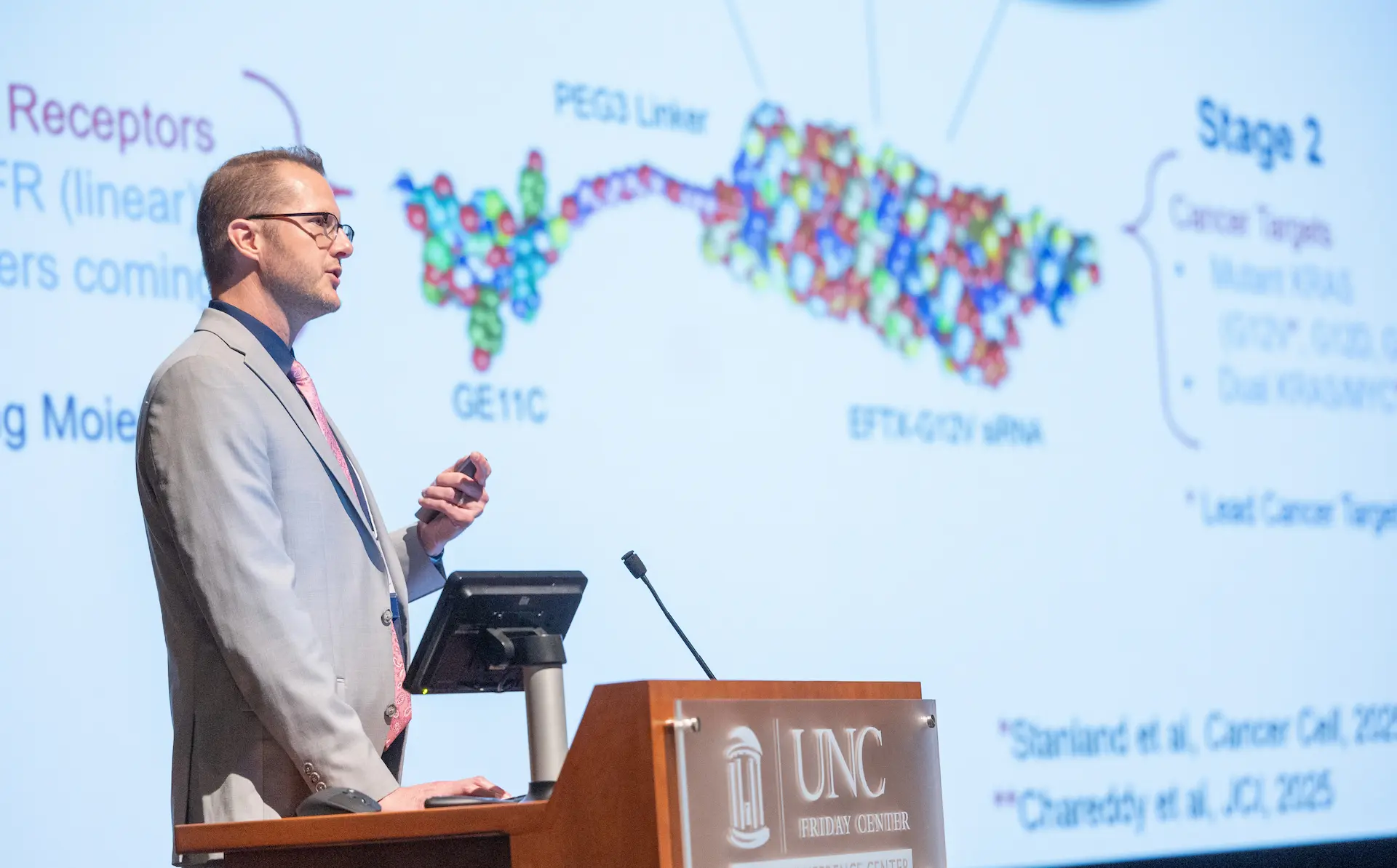 Chad Pecot presents at the 2026 UNC Lineberger symposium.