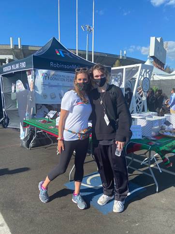Dr. Kate Westmoreland and Mark Robinson at the Robinson Malawi Fund donation booth at Second Sky 2021.