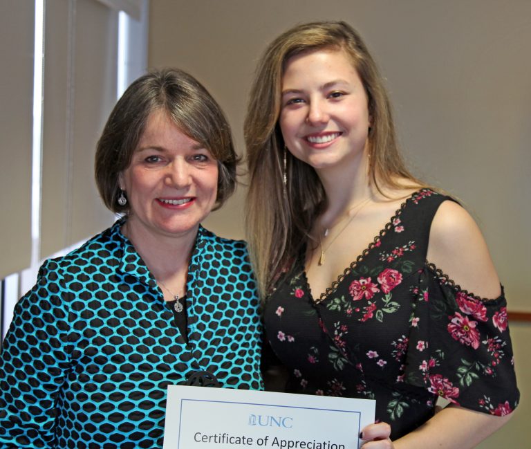 Molly Russell and daughter Tate with Certificate of Appreciation
