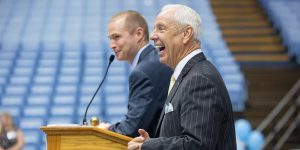 Coach Roy Williams and Jones Angell, the “Voice of the Tar Heels,” spurred on the bidding during the live auction at Fast Break.