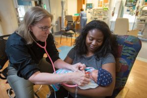 an infant and mom at UNC Children's NICU