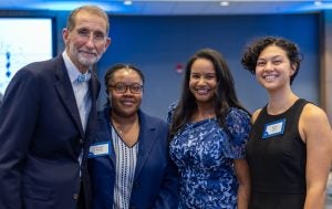 Bill Roper, MD, with UNC second-year medical students Chelsea Onyegi, Theresa Ann Dickerson and Kelsey Rich