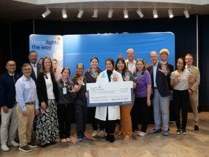 Check presentation featuring UNC Children's physicians and staff with Hyundai Hope on Wheels staff and patients